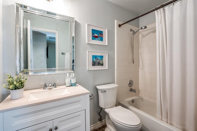 1433 Rogers Ct, Allen, TX 75013 - bathroom with a textured wall, shower / bath combination with curtain, toilet, and vanity