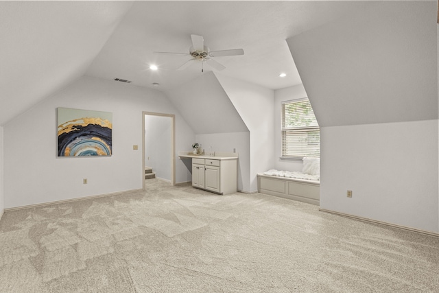 bonus room with vaulted ceiling, light colored carpet, ceiling fan, and recessed lighting