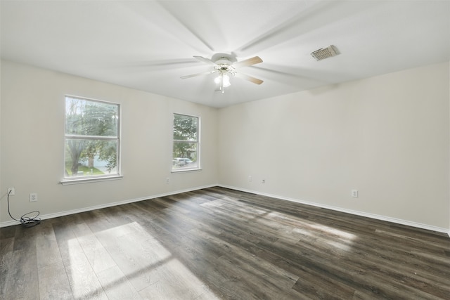 2324 Southway, Denton, TX 76207 - unfurnished room featuring a ceiling fan, dark wood finished floors, and baseboards
