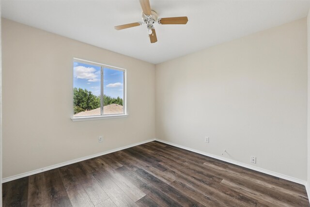 2324 Southway, Denton, TX 76207 - unfurnished room with dark wood-style flooring, baseboards, and ceiling fan