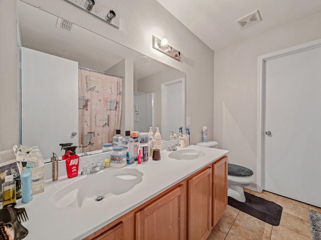 9228 Cheswick Dr, Fort Worth, TX 76123 - full bathroom with toilet, double vanity, curtained shower, and tile patterned floors