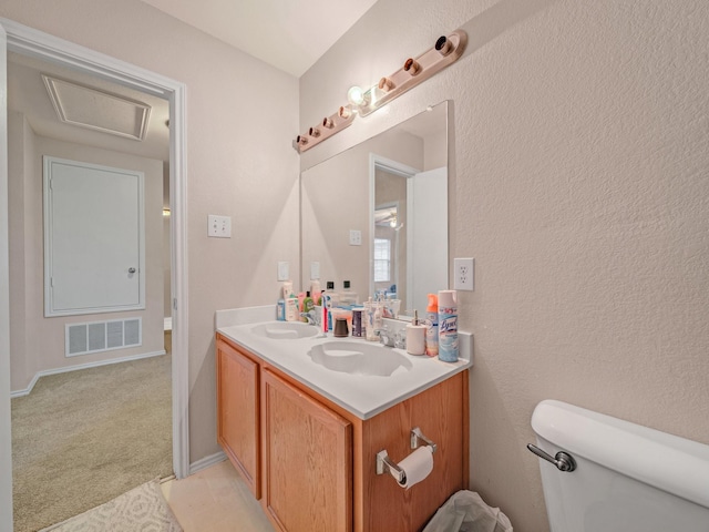 9228 Cheswick Dr, Fort Worth, TX 76123 - bathroom featuring toilet and double vanity