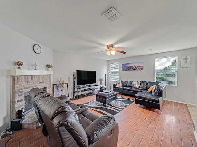9228 Cheswick Dr, Fort Worth, TX 76123 - living room with hardwood / wood-style floors, a ceiling fan, healthy amount of natural light, and a fireplace