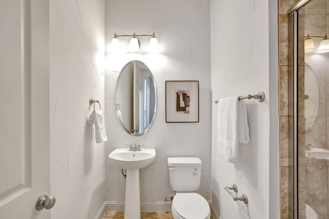 11393 Classic Ln, Frisco, TX 75033 - full bathroom featuring toilet, a tile shower, and a sink