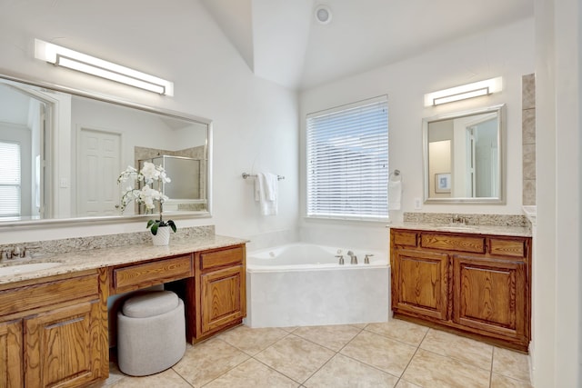 11393 Classic Ln, Frisco, TX 75033 - full bathroom featuring a shower stall, a bath, tile patterned floors, two vanities, and vaulted ceiling
