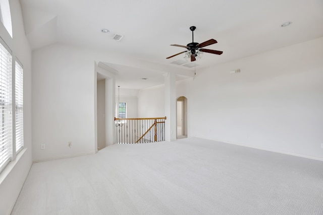 11393 Classic Ln, Frisco, TX 75033 - empty room featuring carpet floors, a ceiling fan, baseboards, and arched walkways