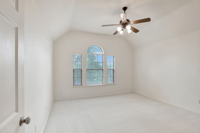 11393 Classic Ln, Frisco, TX 75033 - empty room featuring light carpet, lofted ceiling, ceiling fan, and baseboards
