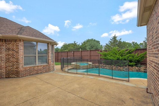 11393 Classic Ln, Frisco, TX 75033 - view of swimming pool with a fenced backyard, a patio, and a pool with connected hot tub
