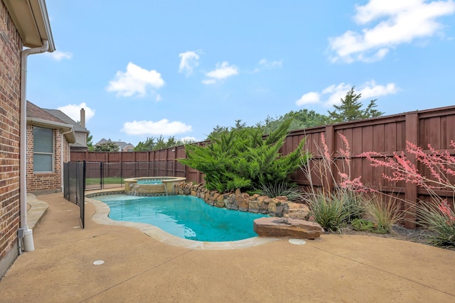 11393 Classic Ln, Frisco, TX 75033 - view of pool with a patio, a fenced backyard, and a pool with connected hot tub