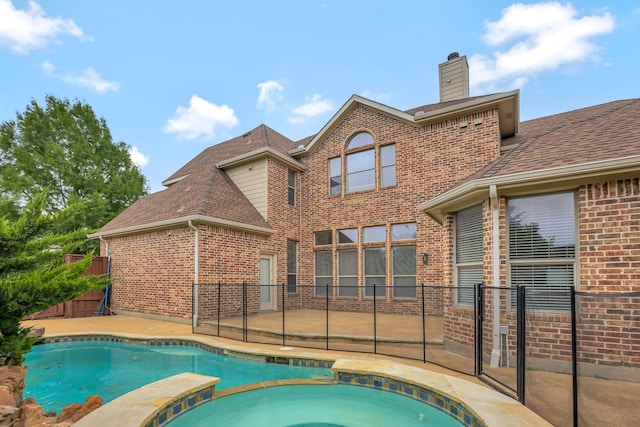 11393 Classic Ln, Frisco, TX 75033 - view of swimming pool featuring fence and a pool with connected hot tub