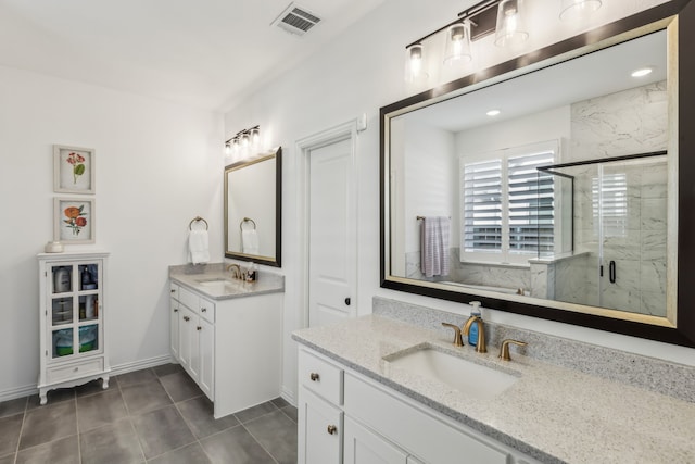 2171 Cloverfern Way, Haslet, TX 76052 - full bathroom featuring a marble finish shower, two vanities, and tile patterned flooring