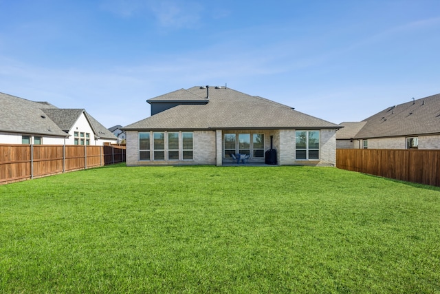 2171 Cloverfern Way, Haslet, TX 76052 - back of house featuring a shingled roof and brick siding