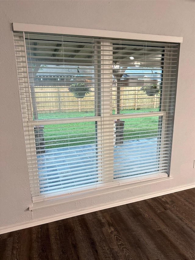553 Oldbridge Dr, Allen, TX 75002 - detailed view of baseboards and wood finished floors