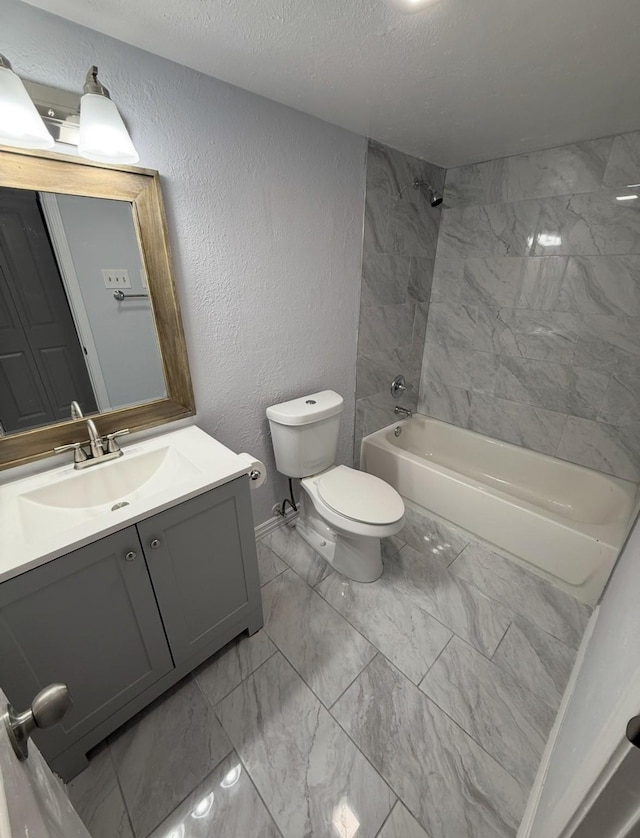 553 Oldbridge Dr, Allen, TX 75002 - full bathroom featuring marble finish floors, toilet, shower / bathtub combination, a textured ceiling, and vanity