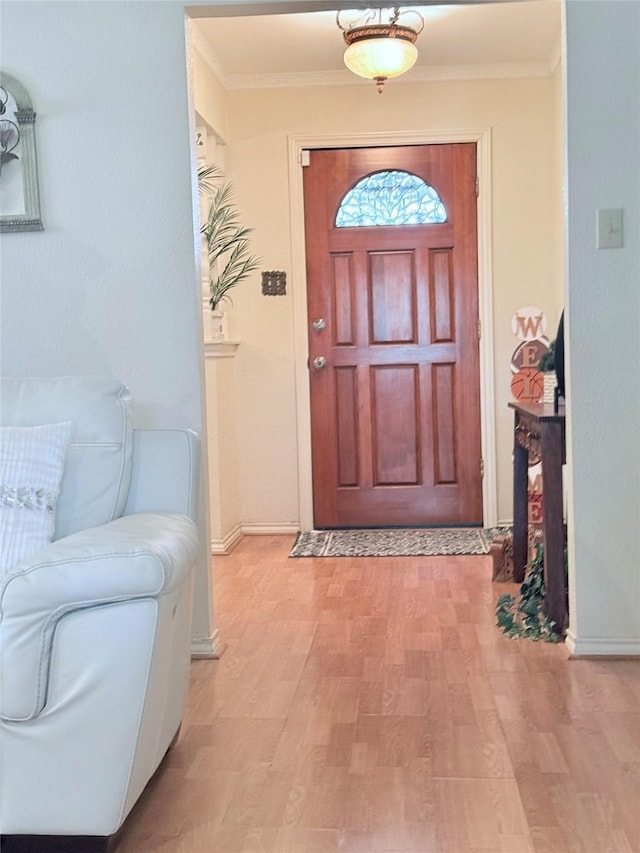 850 Oakbluff Dr, Lancaster, TX 75146 - entryway featuring ornamental molding, light wood-type flooring, and baseboards