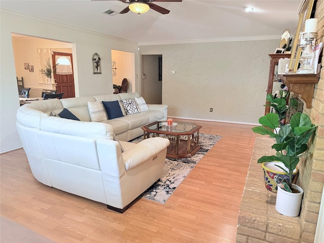 850 Oakbluff Dr, Lancaster, TX 75146 - living area with a ceiling fan, light wood-type flooring, crown molding, and baseboards