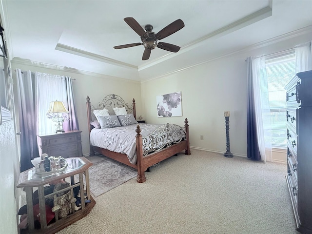 850 Oakbluff Dr, Lancaster, TX 75146 - bedroom featuring a raised ceiling, carpet, crown molding, a ceiling fan, and baseboards