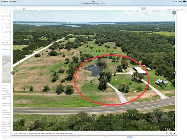 1675 Fm 1713, Morgan, TX 76671 - aerial view of a forest and a large body of water