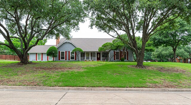 521 Crestridge Rd, Heath, TX 75032 - single story home with a chimney, a front yard, a porch, and a shingled roof
