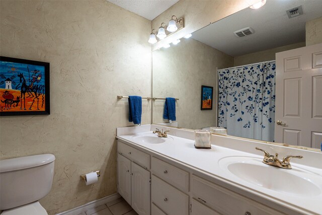521 Crestridge Rd, Heath, TX 75032 - full bath featuring toilet, double vanity, tile patterned floors, baseboards, and a shower with curtain