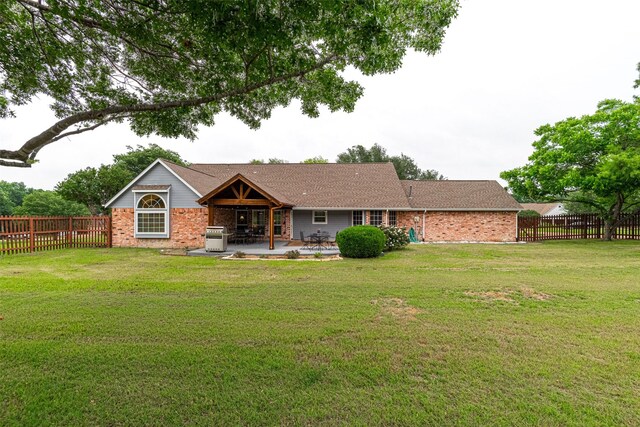 521 Crestridge Rd, Heath, TX 75032 - back of house with a patio and brick siding