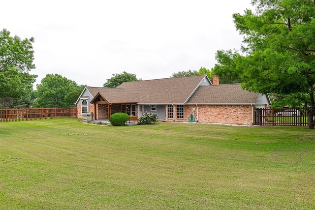 521 Crestridge Rd, Heath, TX 75032 - back of house with brick siding, a chimney, and a patio