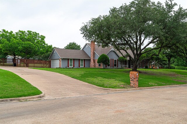 521 Crestridge Rd, Heath, TX 75032 - view of front of property featuring driveway and a chimney