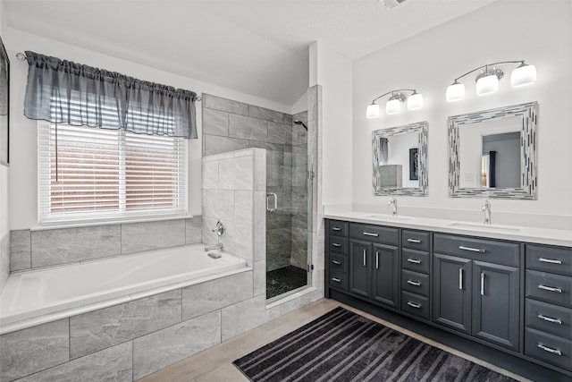 6706 Trumpet Dr, Rowlett, TX 75089 - full bath with double vanity, a stall shower, and a bath