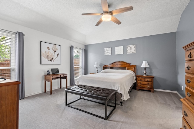 6706 Trumpet Dr, Rowlett, TX 75089 - bedroom with light colored carpet, a textured ceiling, a ceiling fan, and baseboards