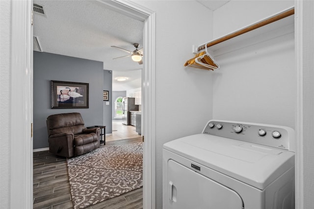 6706 Trumpet Dr, Rowlett, TX 75089 - laundry room featuring washer / clothes dryer, ceiling fan, wood finished floors, and baseboards