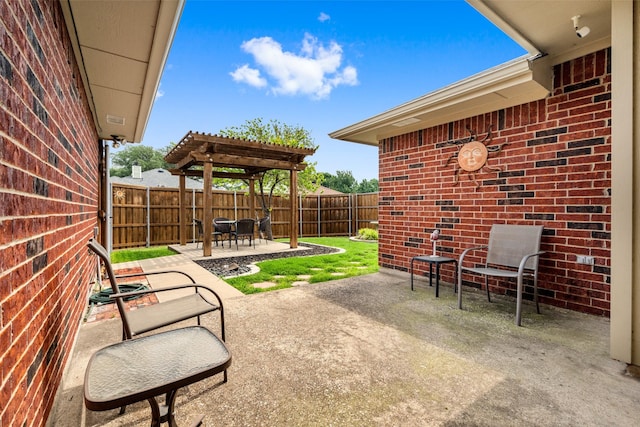 6706 Trumpet Dr, Rowlett, TX 75089 - fenced backyard with a patio area and a pergola