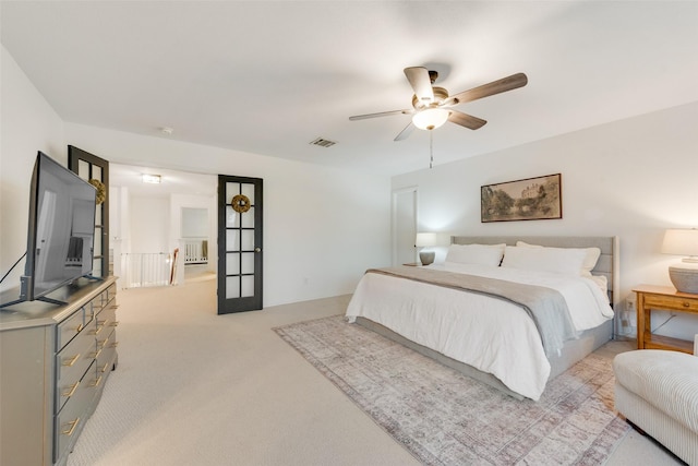 7536 Brentwood Stair Rd, Fort Worth, TX 76112 - bedroom featuring light carpet and ceiling fan