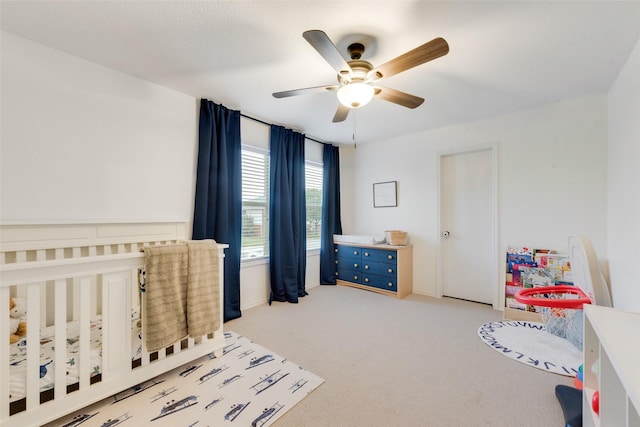 7536 Brentwood Stair Rd, Fort Worth, TX 76112 - carpeted bedroom featuring ceiling fan and a crib