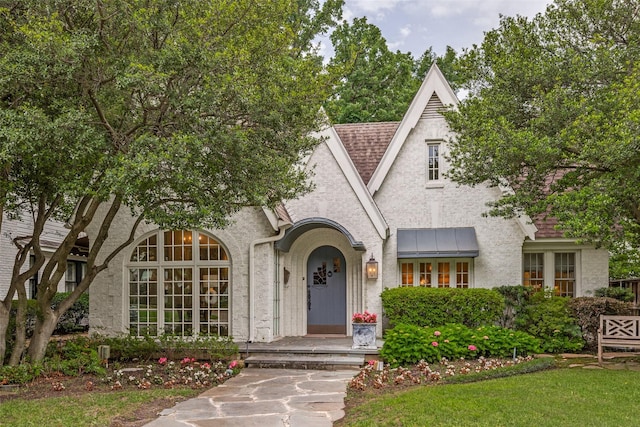 3437 Purdue St, University Park, TX 75225 - view of front facade featuring stucco siding, roof with shingles, and a standing seam roof