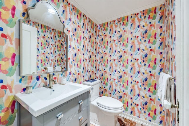 3437 Purdue St, University Park, TX 75225 - bathroom featuring crown molding, toilet, vanity, and wallpapered walls