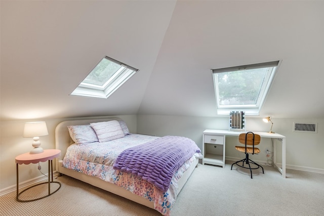 3437 Purdue St, University Park, TX 75225 - carpeted bedroom with a skylight, vaulted ceiling, and baseboards