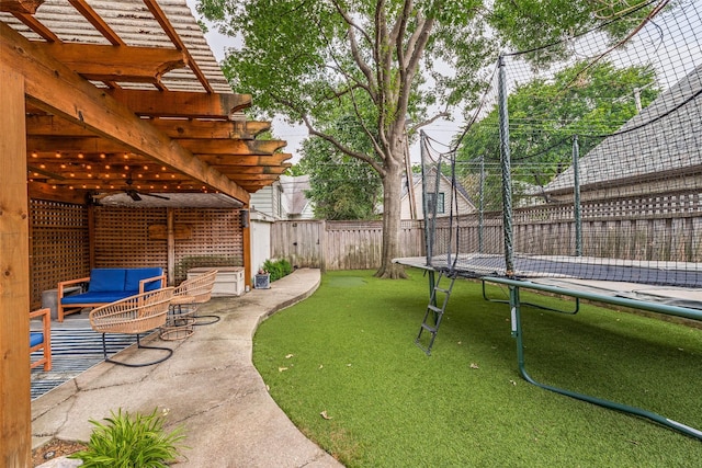 3437 Purdue St, University Park, TX 75225 - view of yard featuring a trampoline, a ceiling fan, a patio, an outdoor hangout area, and a pergola
