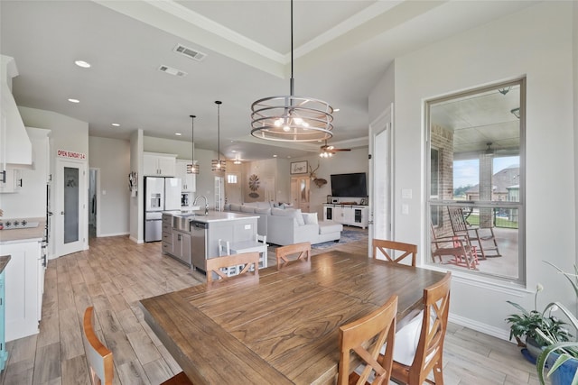 115 Lavender Ln, Springtown, TX 76082 - dining space featuring ornamental molding, light wood-type flooring, a ceiling fan, baseboards, and recessed lighting