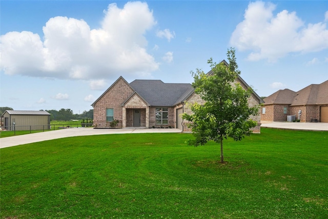 115 Lavender Ln, Springtown, TX 76082 - view of front of house with brick siding, driveway, and cooling unit