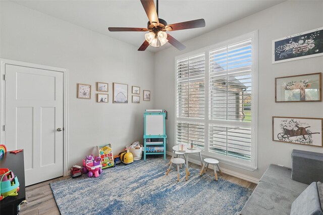 115 Lavender Ln, Springtown, TX 76082 - recreation room with a ceiling fan, wood finished floors, and baseboards