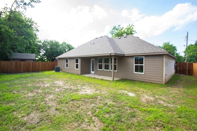 519 W James St, Wills Point, TX 75169 - rear view of property featuring a patio and a shingled roof