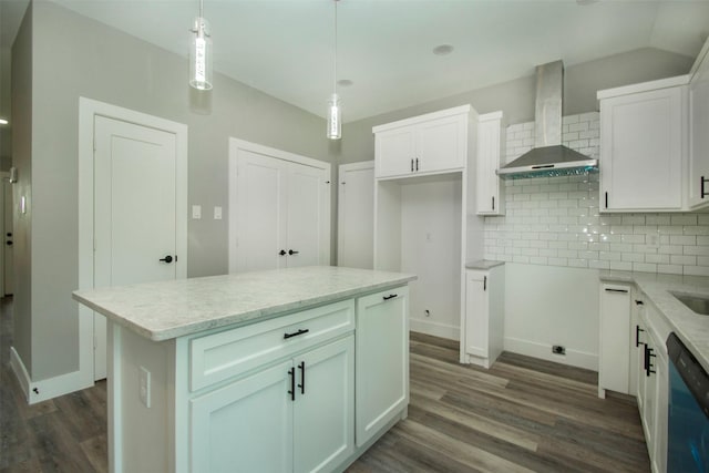 519 W James St, Wills Point, TX 75169 - kitchen featuring wall chimney range hood, dishwasher, dark wood-style flooring, decorative backsplash, and white cabinets