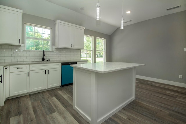 519 W James St, Wills Point, TX 75169 - kitchen featuring a sink, dishwashing machine, dark wood-style floors, tasteful backsplash, and vaulted ceiling