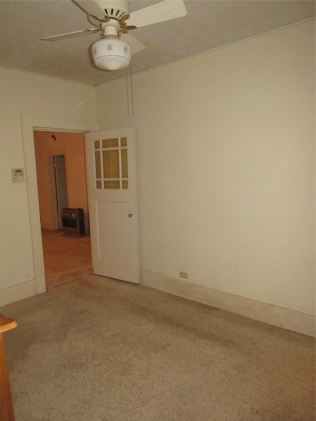 101 E Murray St, Denison, TX 75021 - carpeted empty room with a ceiling fan and baseboards