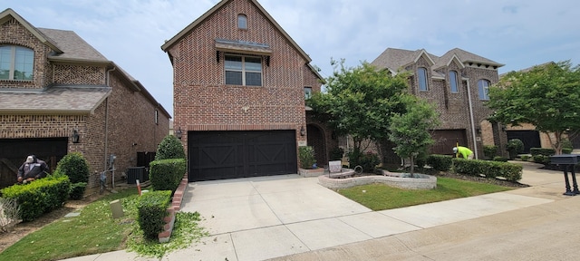 3805 Bentley Dr, Bedford, TX 76021 - view of front of property featuring concrete driveway, a garage, and brick siding