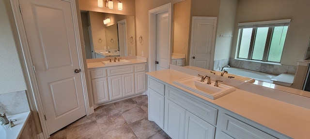 3805 Bentley Dr, Bedford, TX 76021 - full bath featuring two vanities and a garden tub