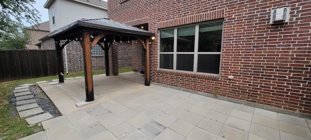 3805 Bentley Dr, Bedford, TX 76021 - view of patio featuring a gazebo
