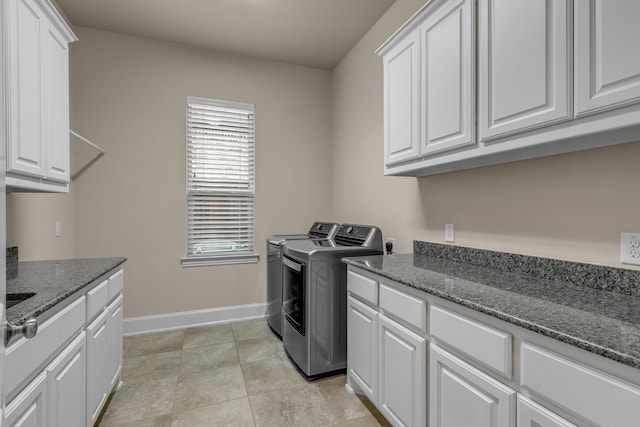 444 Francie Way, Allen, TX 75013 - laundry room featuring separate washer and dryer, cabinet space, baseboards, and light tile patterned flooring