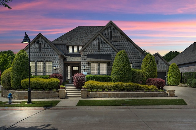 444 Francie Way, Allen, TX 75013 - french country style house featuring driveway, a standing seam roof, a garage, and metal roof