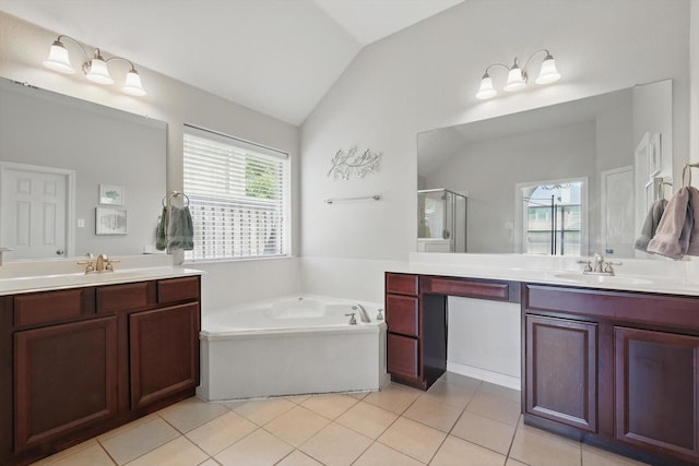 12303 Blue Ridge Dr, Frisco, TX 75033 - full bathroom featuring vaulted ceiling, a shower stall, a bath, two vanities, and tile patterned floors